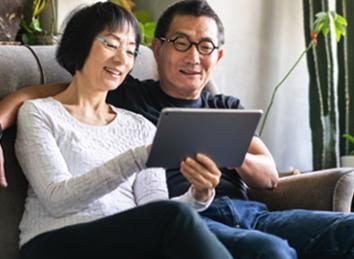 Couple reviewing their Retiree Healthcare forms.