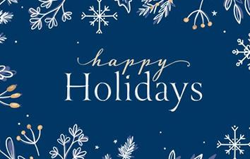 Winter background with text Happy Holidays.