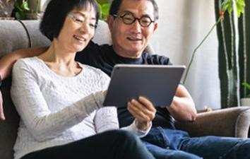 Couple reviewing their Retiree Healthcare forms.